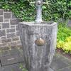 Brunnen mit Jacobsmuschel, Kloster Maria Laach, Eifel
