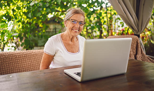 Freepik_elderly-happy-senior-woman-working-online-with-laptop-computer-outdoor-in-the-garden-remote-work_user14699452.jpg