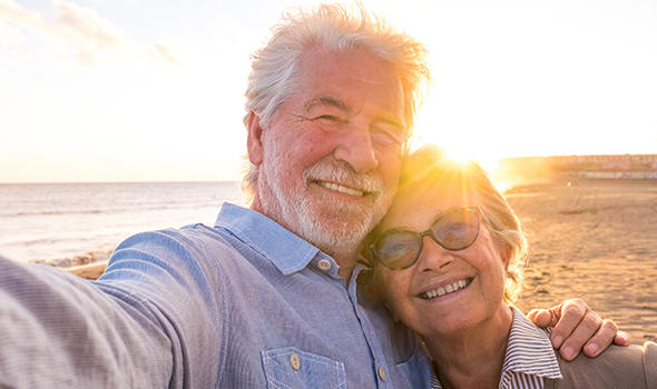 Freepik_portrait-of-couple-of-mature-and-old-people-enjoying-summer-at-the-beach-looking-to-the-camera-taking-a-selfie-together-with-the-sunset-at-the-background-two-active-seniors-traveling-outdoors_Camandona.jpg