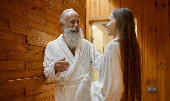 man-and-woman-talking-in-spa-sauna.jpeg