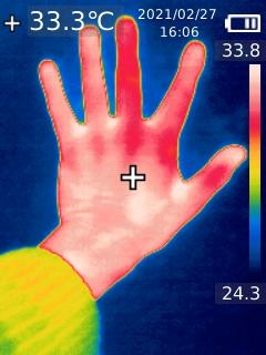 Wärmebild meiner auf Tapete abgestützten Hand